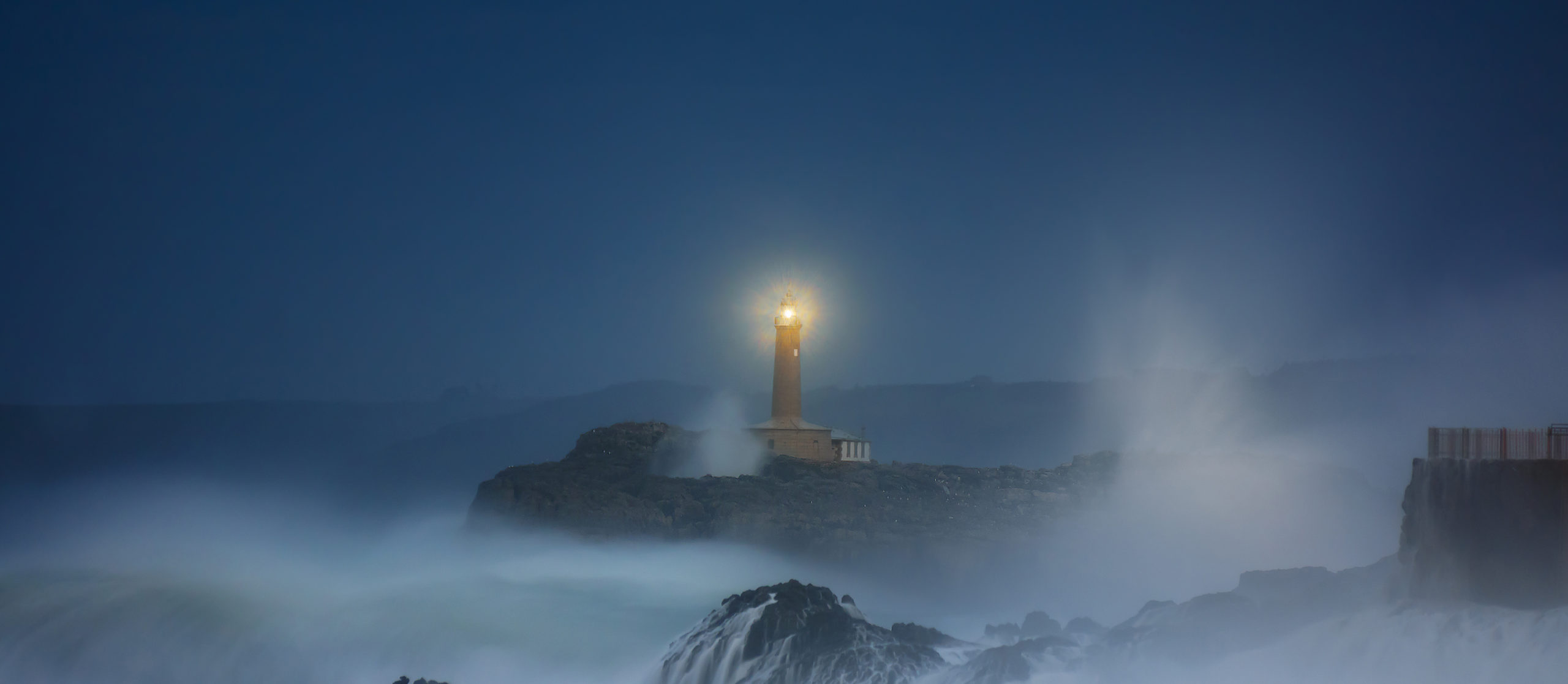 Mouro lighthouse in Santander at night